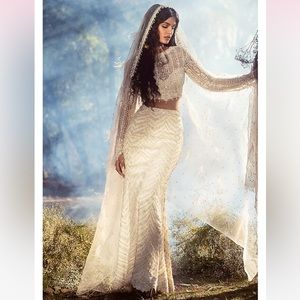 Wedding dress fully embellished in pearls and feathers made w/ pure satin silk